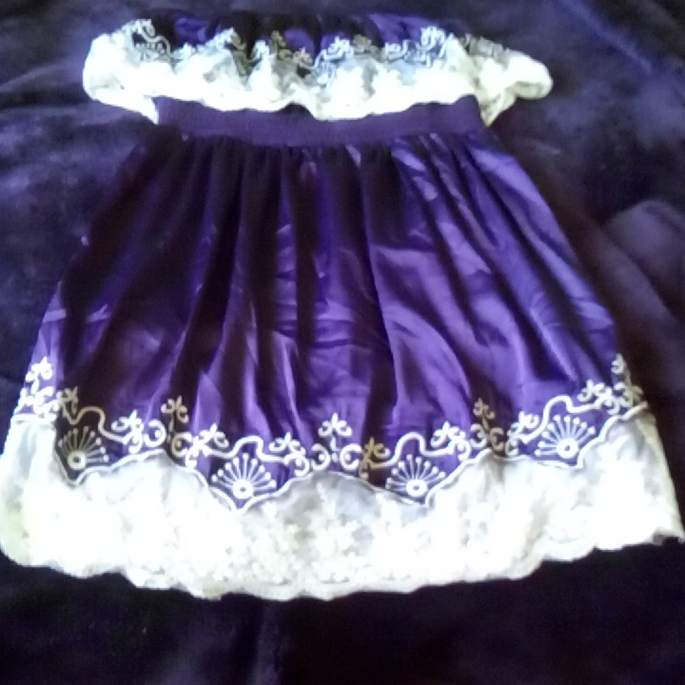 Purple strapless dress with white lace trim